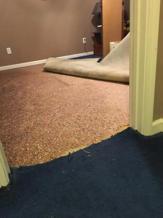 Carpet pad removal revealing water damage during Drying & Dehumidification in Arizona City